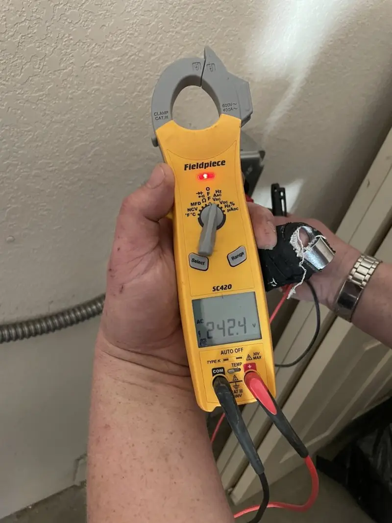 Voltage testing with clamp meter during Recessed Lighting Installation in Bloomfield
